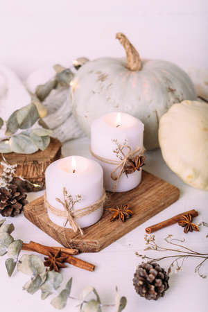 Autumn composition with pumpkin and candles. Beautiful autumn decorの写真素材