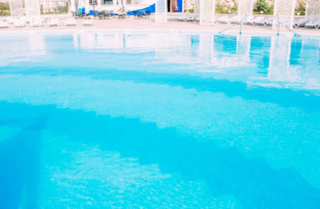 Outdoor swimming pool without people in summer on a sunny day