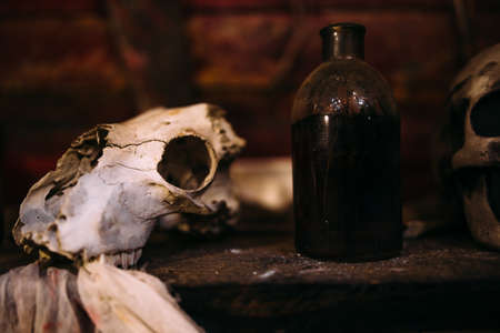 Antique medical bottle. Dark mystery halloween concept