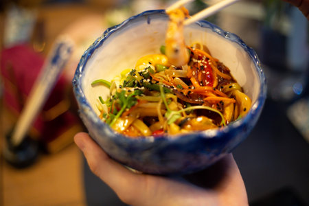 Asian food bowl bowl with shrimp, vegetables and rice noodlesの写真素材