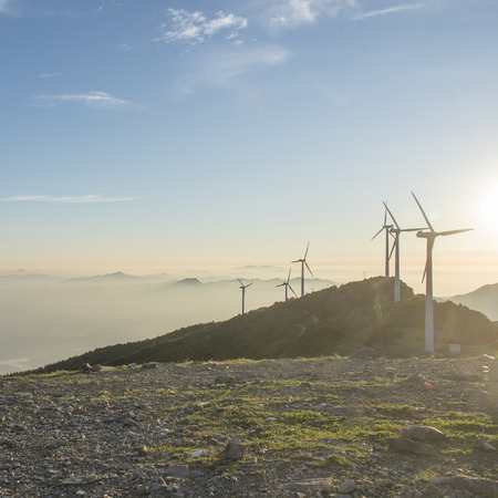 Sunrise mountain windmillの写真素材