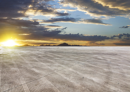 asphalt tire marks under sunsetの写真素材