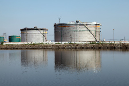 Oil field scene Large oil storage tanks