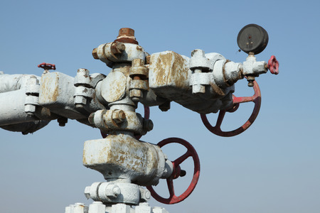 Piping and valves of oil field, close-upの写真素材