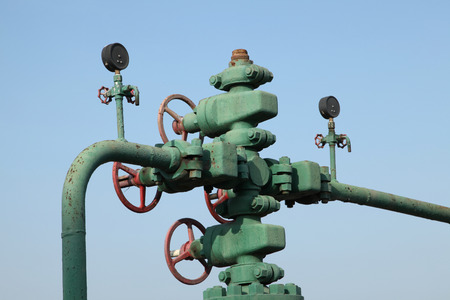 Piping and valves of oil field, close-up
