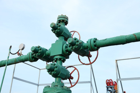 Piping and valves of oil field, close-upの写真素材