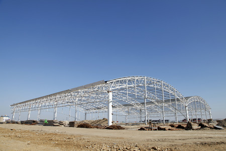 Steel frame structure, under the blue skyの写真素材