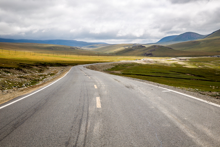 Hillside, winding road.の写真素材