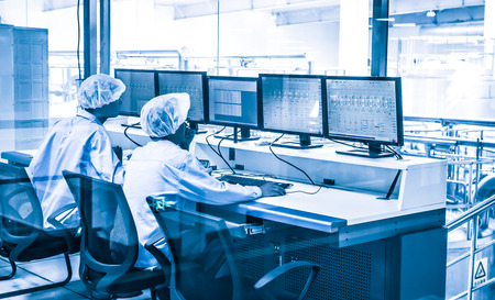 Monitoring staff in the factory.のeditorial素材