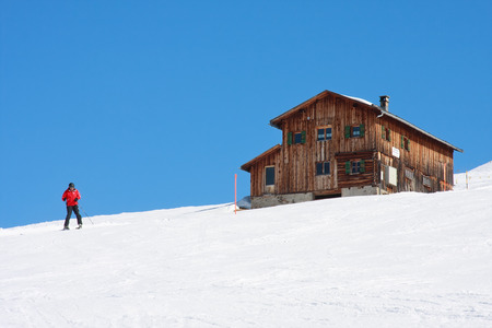 Adult skier doing snow plow at Clavadeler Alp, Davos,Switzerlandのeditorial素材