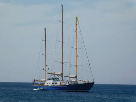 A three mast sailing yacht, near the coast of Attica, in Greece