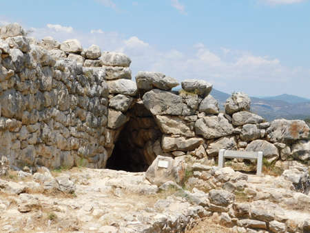 Entrance to a tunnel leading to an underground water source, in the ancient prehistoric citadel of Mycenaeの写真素材