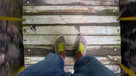 Christmas lights of different colors frame on white backgroundの写真素材