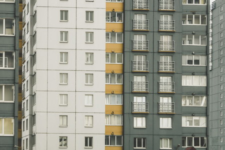 Residential house, windows and balconies from minimalism to classicismの写真素材