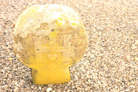 Yellowish tombstone in french burial groundの写真素材