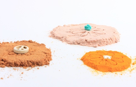 Nutmeg,curcuma and pink salt in flowerの写真素材