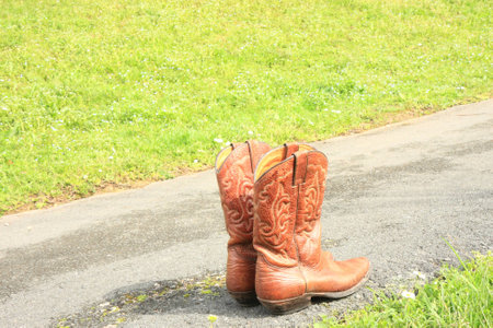 Road and bootの写真素材