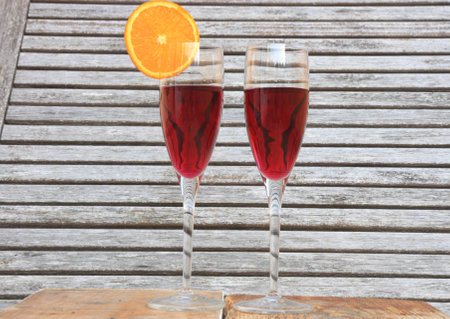 Red wine with orangeの写真素材