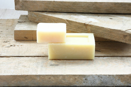 Soap over woodの写真素材