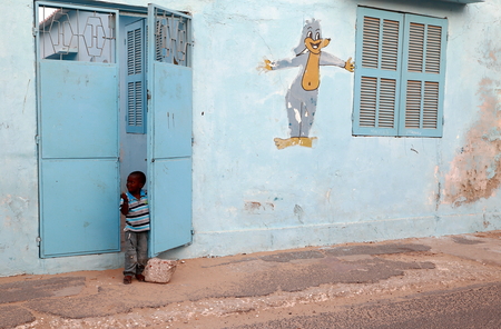 SAINT LOUIS DU SENEGAL,SENEGAL-APRIL 18, 2014  Children peeps out the school on April 18, in Senegal のeditorial素材