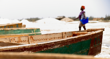 DAKAR,SENEGAL-APRIL 20, 2014  The local people extract salt from the pink lake on April 20, in Dakar-Senegal のeditorial素材