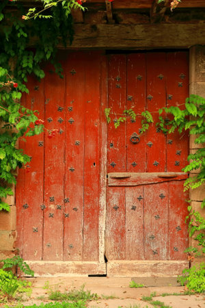 Antique red door-Irouleguyの写真素材