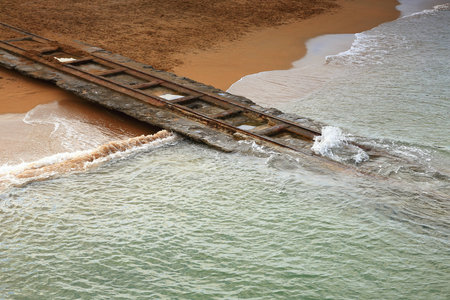 Railway on the beach-Franceの写真素材