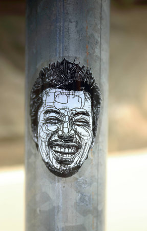 BIARRITZ, FRANCE-SEPTEMBER 7, 2014: Street artists paint the walls of the city with his works on September 7, in Biarritz-France.のeditorial素材