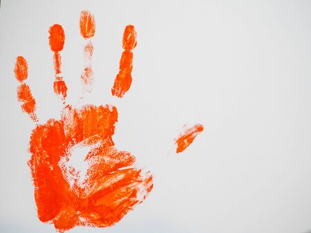 isolated gouache drawing bloody handprint on a white backgroundの写真素材