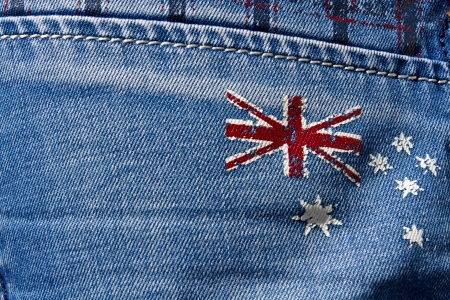 Abstract grunge flag of Australia on a blue jeans background の写真素材
