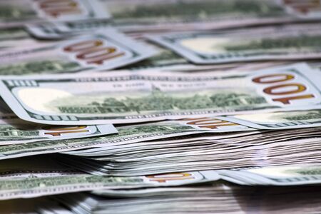 US dolllars bills money packs background. Side view. Macro close up.の写真素材