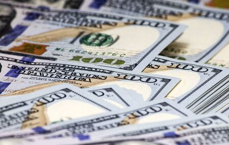 Close Up of Stack of dollars on one hundred dollar bills. Close up Background.の写真素材