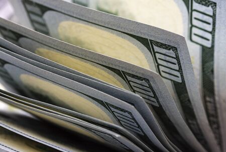 Close up american dollar banknotes. Back side. Hundred dollars background
