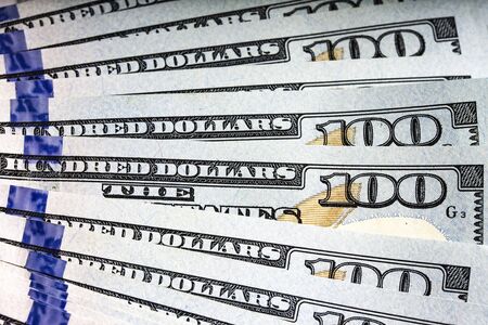 One hundred dollars money close up background.