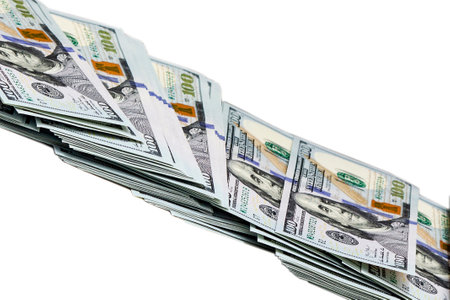 100 US dollars bills isolated on whiteのeditorial素材
