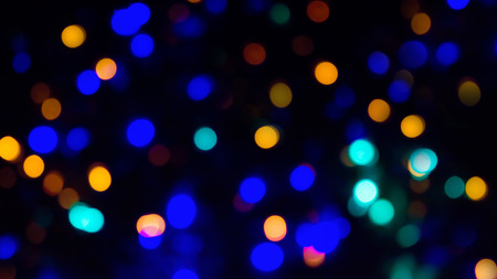 Abstract background in blue red yellow shades. Dim the lights illumination.