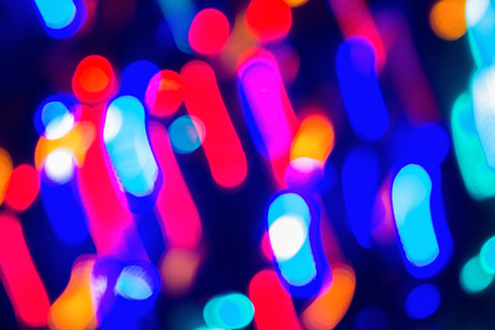 Abstract background in blue red colours. Bokeh. Colorful and dim the lights. Dim the lights illumination. Effect of movementの写真素材