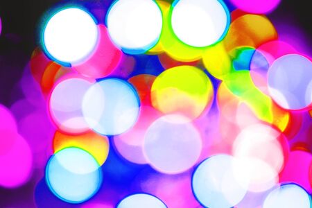 Blurry garland with little lights. Neon toning. abstract background of neon lights bokeh,neon lights...