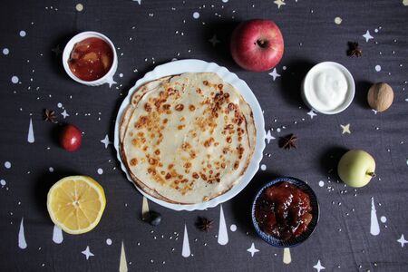 outline of the universe with pancake as Sun and planets as fruits and toppings