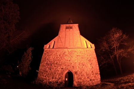 a church in a foggy november night の写真素材
