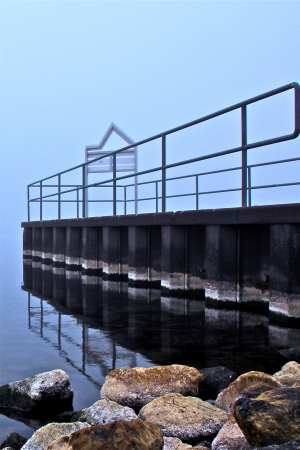 a bridge on a foggy autumn dayの写真素材