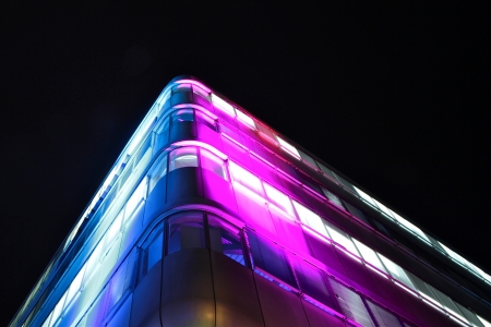 a building in the night meets color lightの写真素材