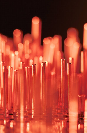 a group of metal rods meets colored lightの写真素材