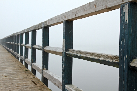 a lake on a foggy october morningの写真素材