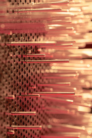 a group of metal rods meets colored lightの写真素材