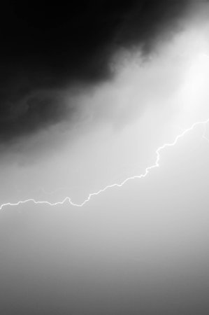 the dark sky and  a flashの写真素材