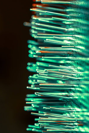 a group of metal rods meets colored lightの写真素材