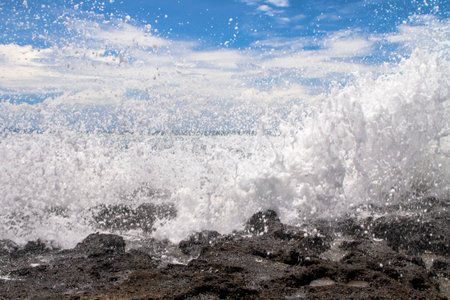 a beach of the ocean on a hot summer day
