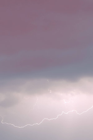 the dark sky and the flashの写真素材