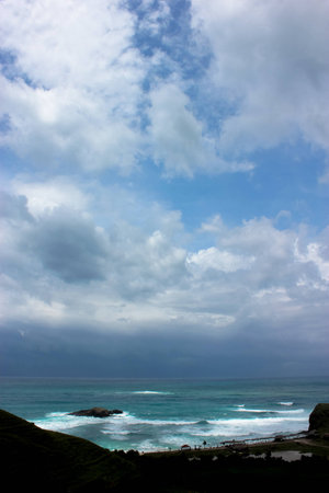 a beach of the ocean on a hot summer dayの写真素材